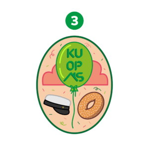 Soikea haalarimerkki, jossa on vihreä ilmapallo, valkolakki ja munkki vaaleanpunaisella taustalla. KUOPAS-teksti on painettu ilmapalloon. Oval-shaped patch featuring a green balloon, a Finnish student cap, and a doughnut on a pink background. The word "KUOPAS" is printed on the balloon.